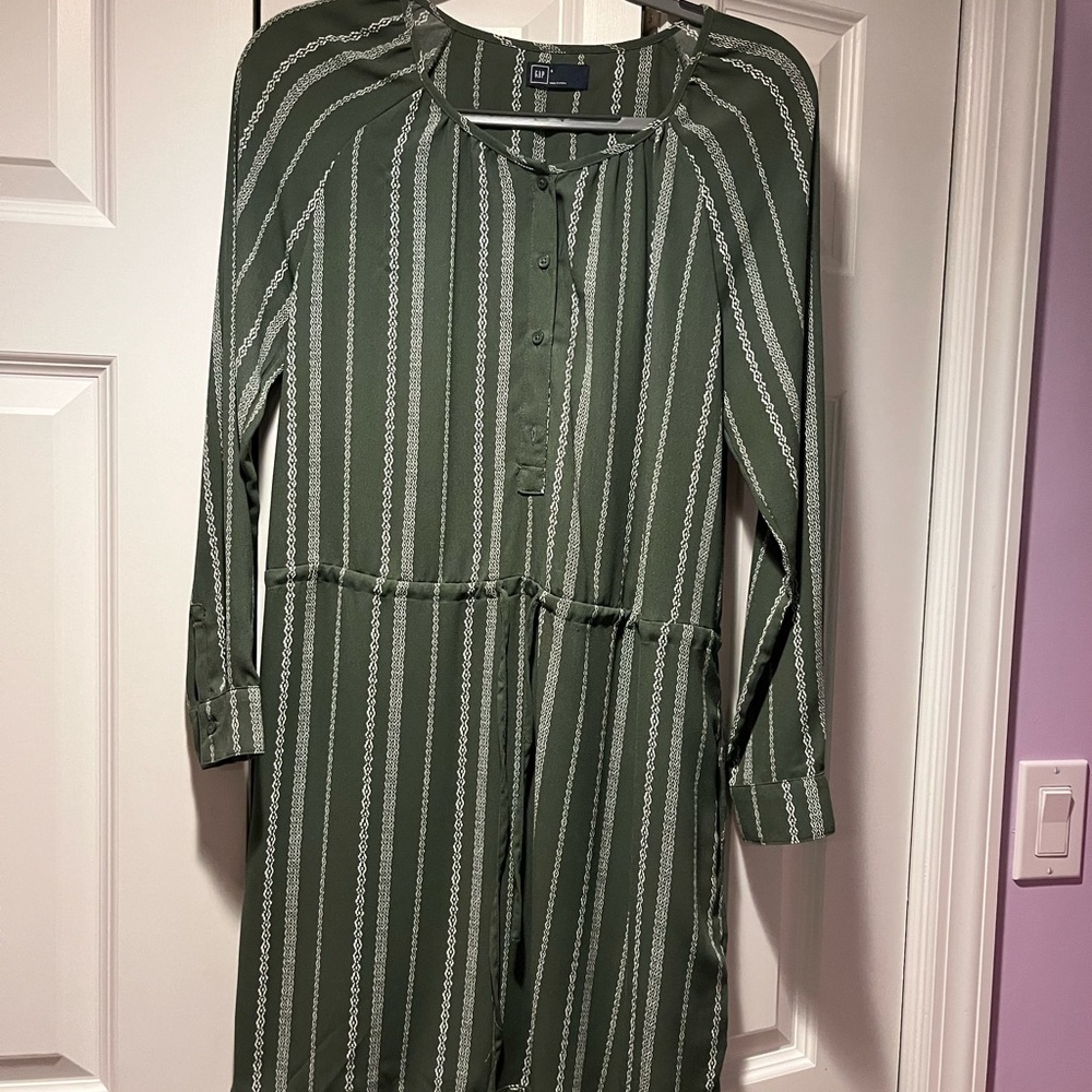 Khaki and white long sleeve light material dress.